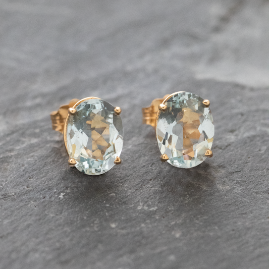 Oval Aquamarine Post Earrings in Yellow Gold